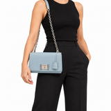 Prada light blue Saffiano shoulder bag worn on model