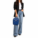 Chanel Blue Quilted Leather Backpack on body