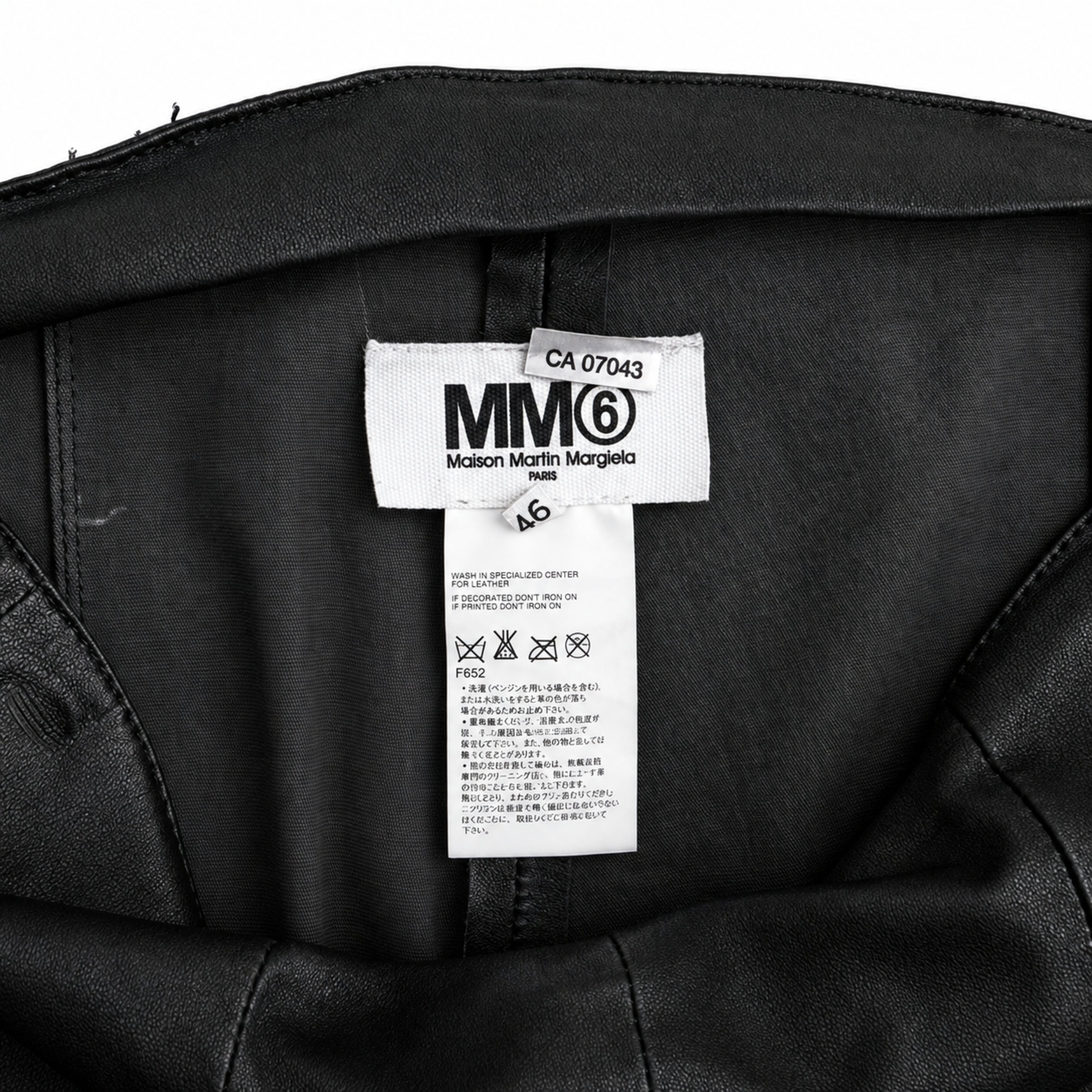 MM6 Maison Margiela black leather trousers label detail