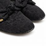 Louis Vuitton black bow loafers 06 toe wear detail
