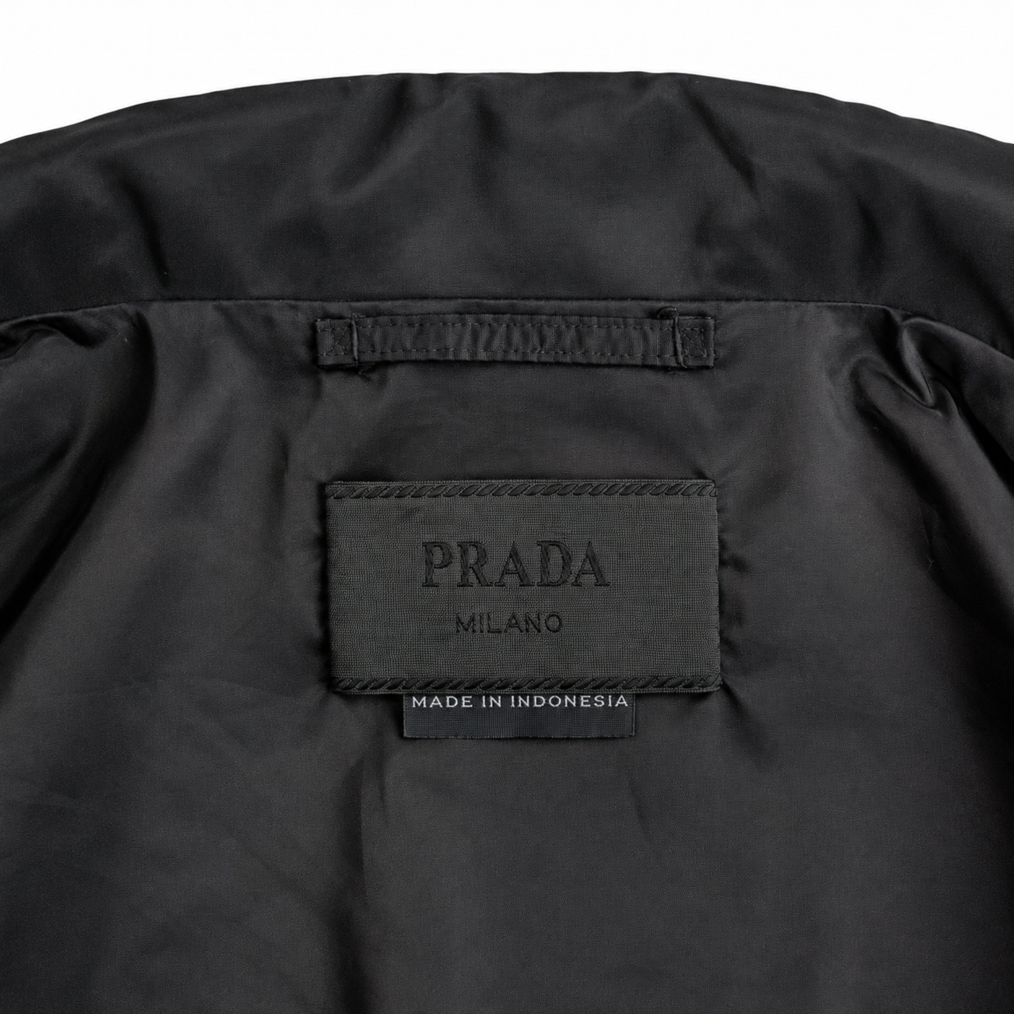 Prada black jacket label detail