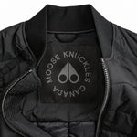 Moose Knuckles black bomber jacket label detail